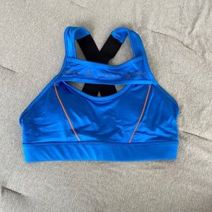 Creatures of xix x Haley sports bra. Blue with orange stitching. Size small